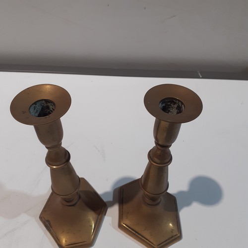 129 - Pair brass candlesticks. Approx 9” high