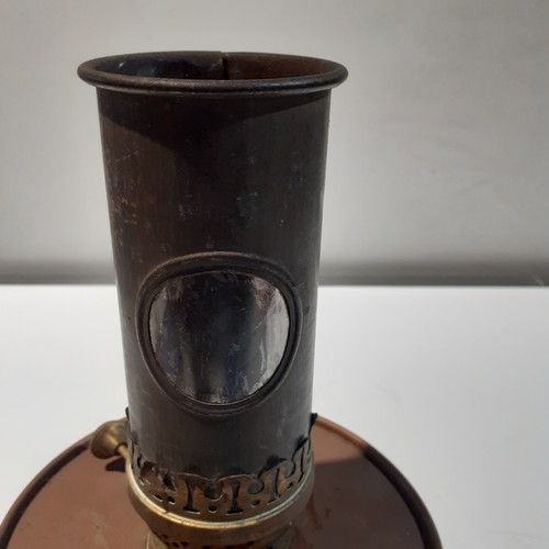 149 - Copper dualwick oil burner. Approx 14” tall