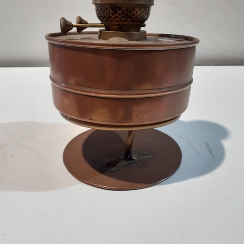 149 - Copper dualwick oil burner. Approx 14” tall