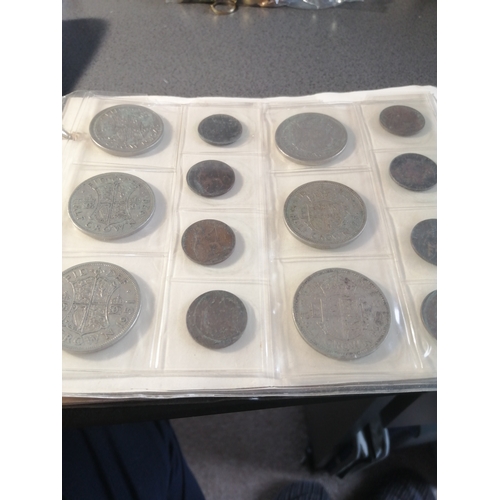 31A - Coin album with 6 pages of coinage together with a ten shilling note