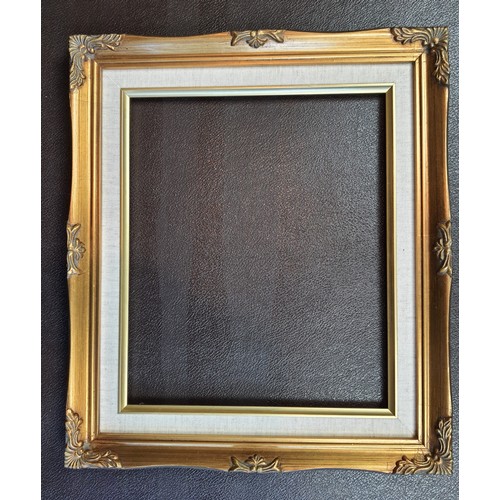 125A - 3 new gold coloured ornate picture frames with fabric detail. Takes pictures sized 10 ins x 12 ins. ... 