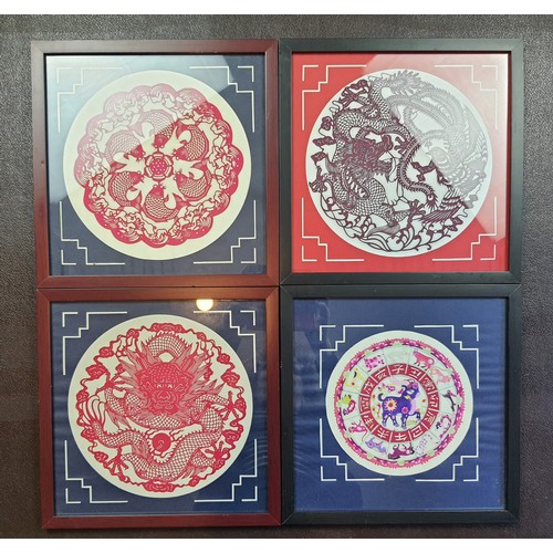 313 - 4 framed Chinese paper art. Dragons, fish and Chinese zodiac. Size: 30cm x 30.3
cm.