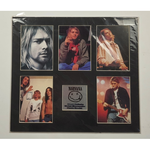 325 - Nirvana print with 1 black & white picture, 4 colour ones and a silver colour metal plaque. In seale... 