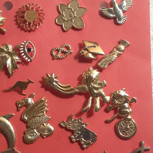 1 - Quantity of metal pin / lapel badges. Mostly gold colour metal, various designs