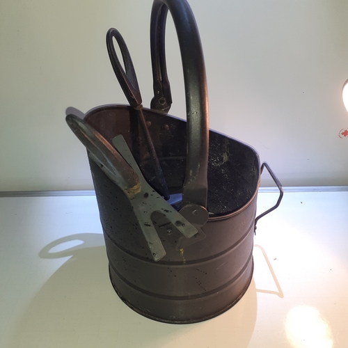 5 - Black metal coal scuttle with a brush and shovel.