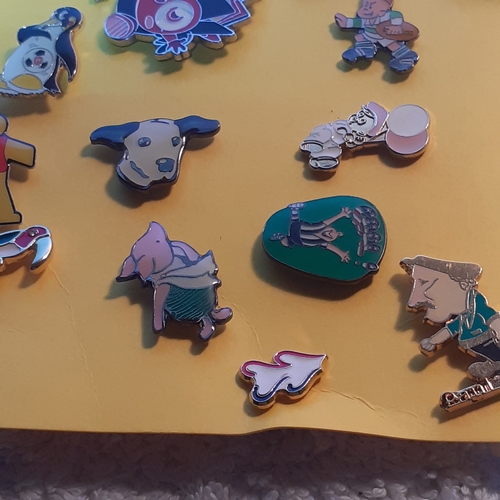 8 - Quantity of metal enamelled pin badges. Cartoon characters,  animals and charity's included.