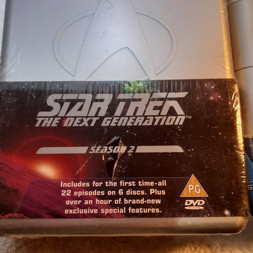 12 - Star trek DVD box sets series one, two and three.  The disks in two and three are unopened, new cond... 