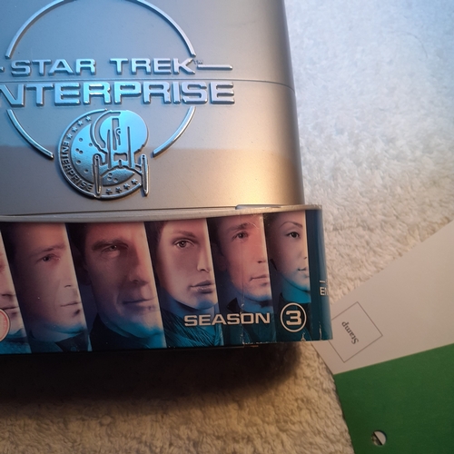 12 - Star trek DVD box sets series one, two and three.  The disks in two and three are unopened, new cond... 