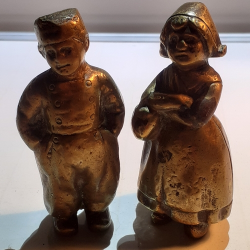 13 - 2 small but heavy solid brass dutch figures. Man and woman