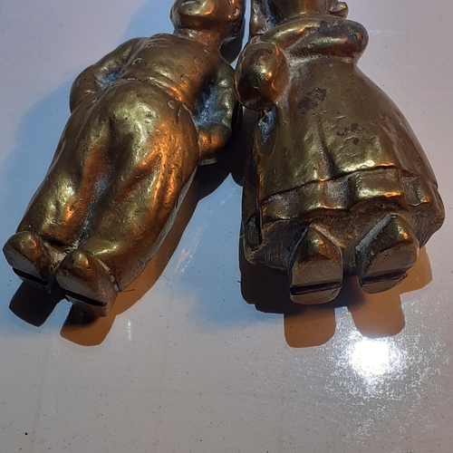 13 - 2 small but heavy solid brass dutch figures. Man and woman