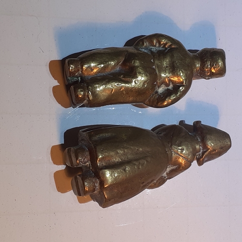 13 - 2 small but heavy solid brass dutch figures. Man and woman