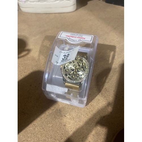 39 - Rebel leopard watch with gold strap - new battery fitted