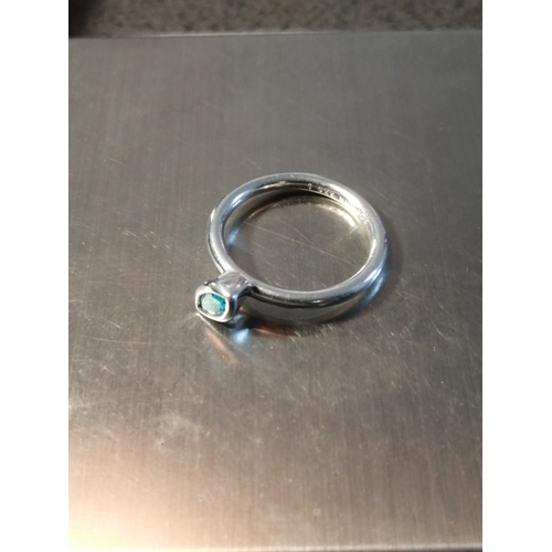 20A - Silver ring with light blue gemstone 2.18 Size J