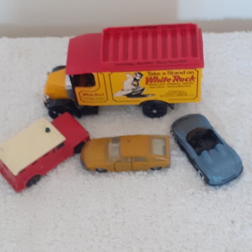 18 - Corgi White rock truck on good condition and 3 smallcars matchbox and hot wheels