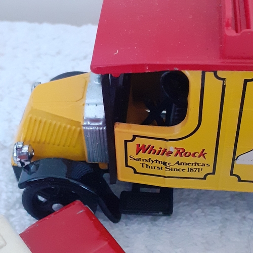 18 - Corgi White rock truck on good condition and 3 smallcars matchbox and hot wheels