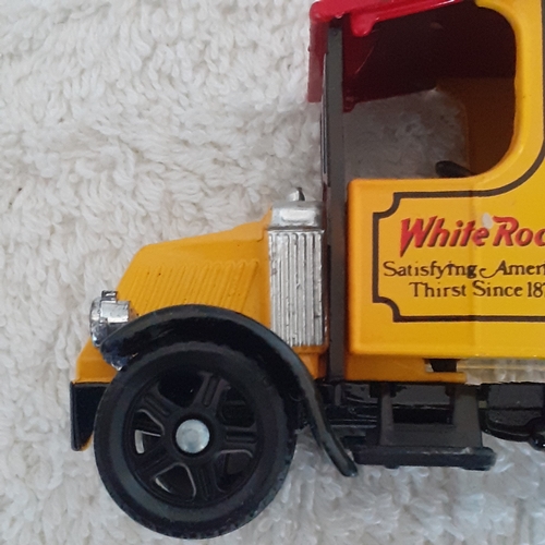 18 - Corgi White rock truck on good condition and 3 smallcars matchbox and hot wheels