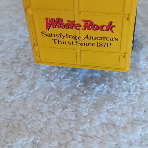 18 - Corgi White rock truck on good condition and 3 smallcars matchbox and hot wheels