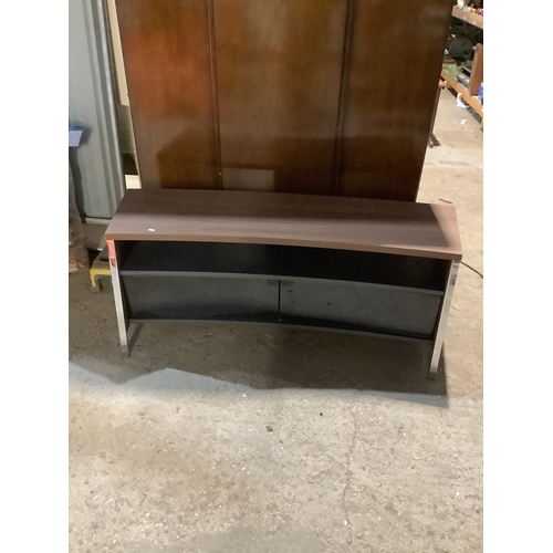 303A - Stylish curved glass fronted tv display stand 1.3m long