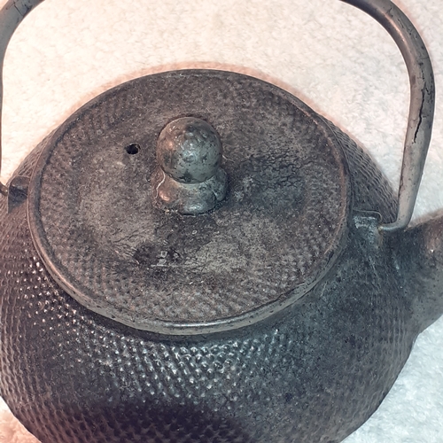 3 - Black cast iron, heavy (approx 2.18 kg) tea kettle.