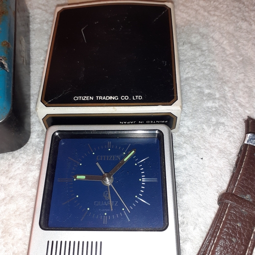 8 - A collection of watches, pocket watch, empty fossil watch tin and vintage travel clock. Sold as spar... 