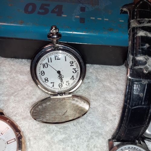 8 - A collection of watches, pocket watch, empty fossil watch tin and vintage travel clock. Sold as spar... 