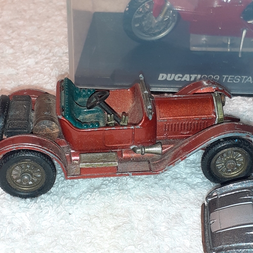 13 - A quantity of diecast vehicles including a Ducatti 999 Testastretta 2003 and some hot wheels and a m... 