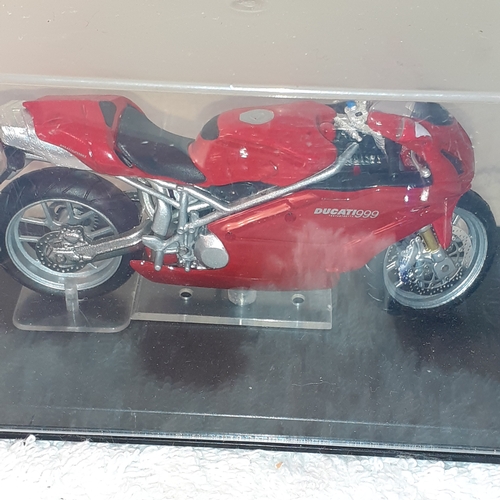 13 - A quantity of diecast vehicles including a Ducatti 999 Testastretta 2003 and some hot wheels and a m... 