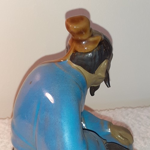 14 - Chinese mud man ornament with duck. App 17cm tall. Cannot see a stamp mark underneath. No damage.