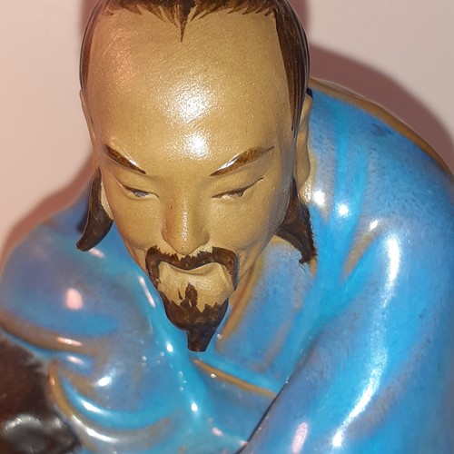 14 - Chinese mud man ornament with duck. App 17cm tall. Cannot see a stamp mark underneath. No damage.