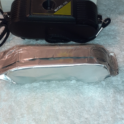 18 - Vintage Micro 110 camera with sealed film in foil.