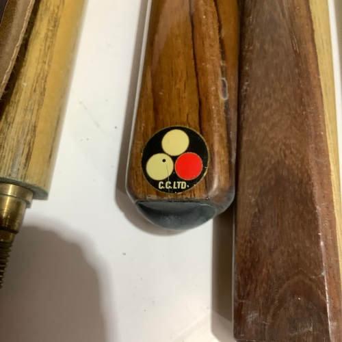 363 - 2x pool cues and case