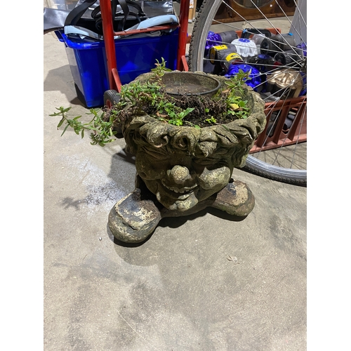 386 - Concrete planter of a smiling man