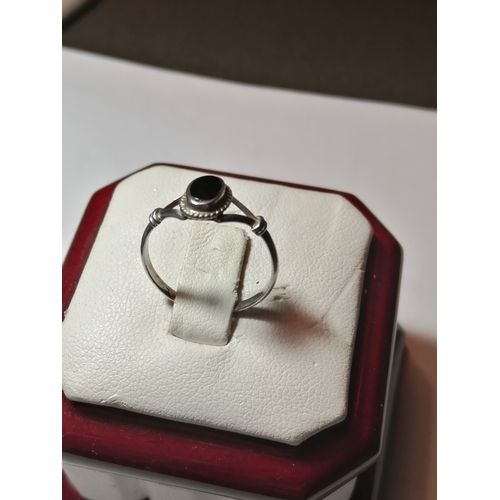 20A - Silver ring set with single black gemstone 1.04 grams Size M