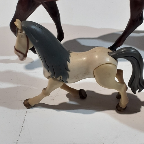 9 - 4 horse ornaments, made from plastic. Nice condition