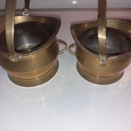 16 - 2 brass planter baskets. Matching design, very slightly different size large one approx 3 inch high ... 