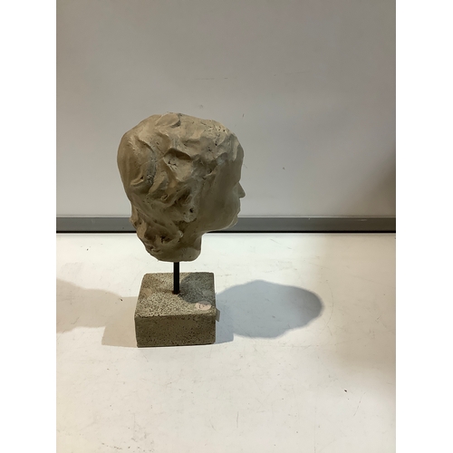 86 - Model sculpture of child’s head on stand