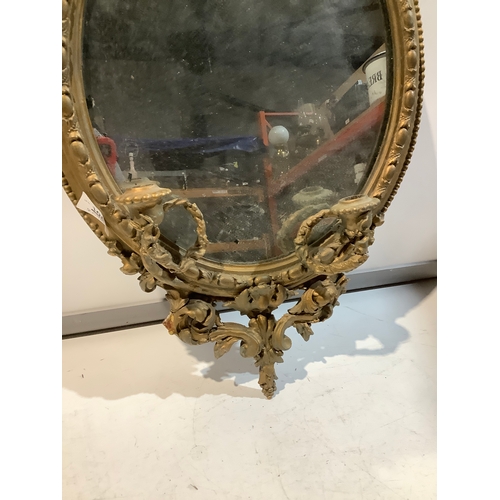 108 - 19th century gold gilted oval mirror with two candle holders