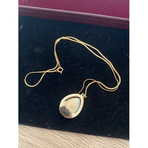 40A - Nickel silver gold coloured necklace with large oval stone pendant