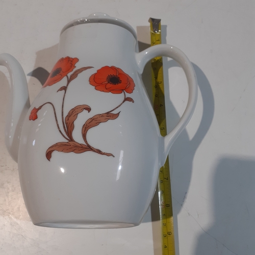 7 - Tall Avon coffee jug with no damage.