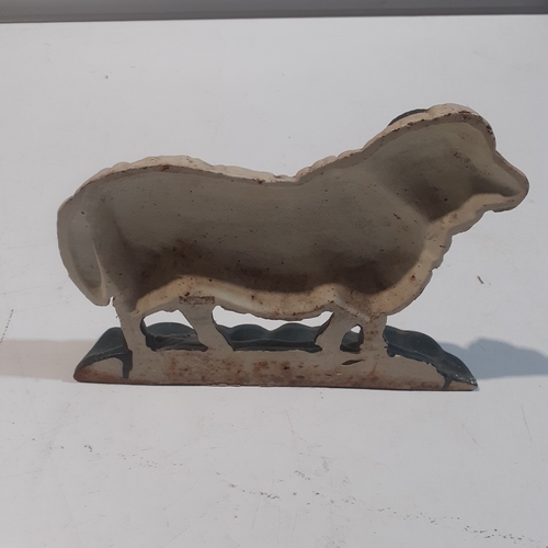 20 - Heavy cast iron good size sheep doorstop.