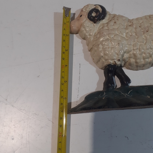 20 - Heavy cast iron good size sheep doorstop.