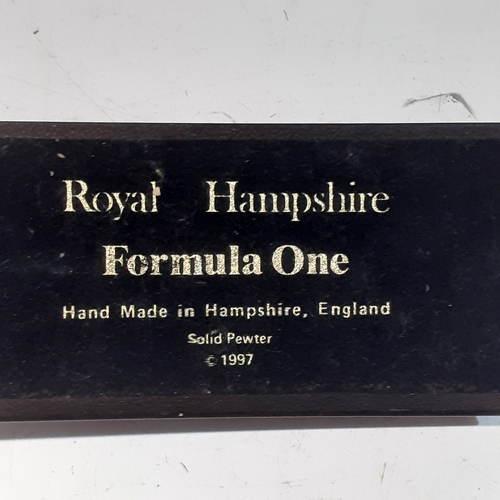 48 - Royal Hampshire Formula One, pewter racing car on wooden plinth.