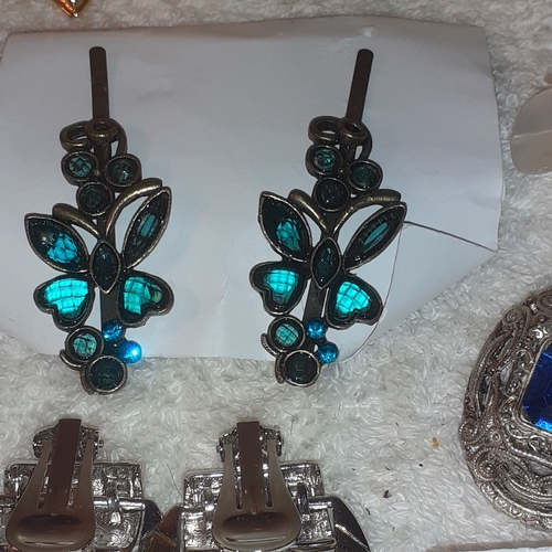 53 - A large quantity of costume jewellery earrings.  Mostly clip on. Some very attractive stones and no ... 