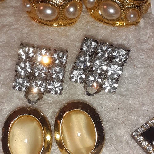 53 - A large quantity of costume jewellery earrings.  Mostly clip on. Some very attractive stones and no ... 