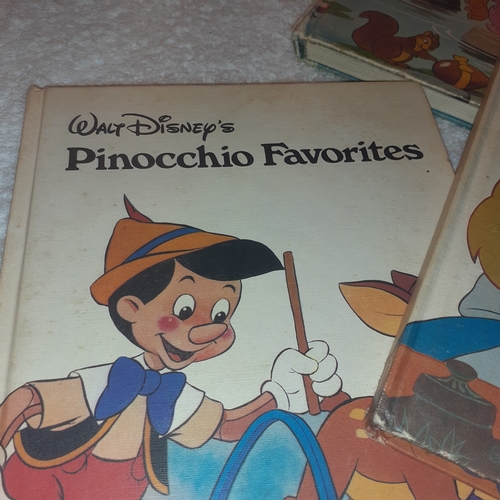 58 - A collection of Walt Disney favourite books. Complete clean pages. Some minor age related wear to co... 