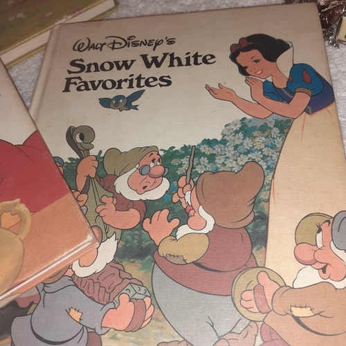 58 - A collection of Walt Disney favourite books. Complete clean pages. Some minor age related wear to co... 