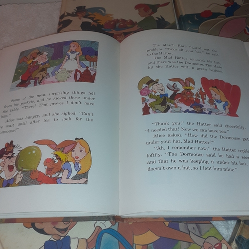 58 - A collection of Walt Disney favourite books. Complete clean pages. Some minor age related wear to co... 