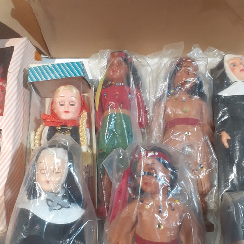 114 - Quantity of vintage dolls representing various countries, religions and profession's.  All wrapped i... 