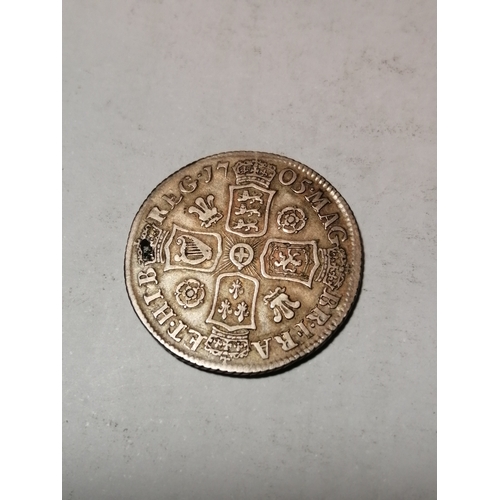 36A - 1705 roses and plumes Queen Anne shilling in about very fine condition