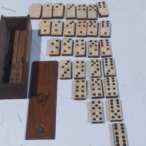 265 - Most likely 1800s or early 1900s possibly ebony and bone domino set. Old played with condition with ... 